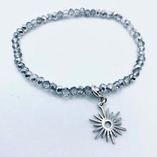 Load image into Gallery viewer, Sunshine from Darkness faceted crystal or hematite bead stretch bracelet with 'Modern Sun' charm