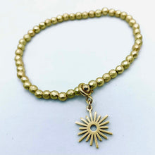 Load image into Gallery viewer, Sunshine from Darkness faceted crystal or hematite bead stretch bracelet with 'Modern Sun' charm