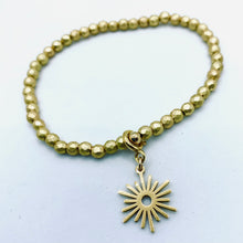 Load image into Gallery viewer, Sunshine from Darkness faceted crystal or hematite bead stretch bracelet with 'Modern Sun' charm