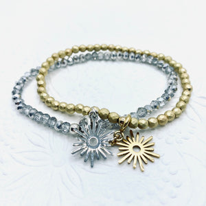 Sunshine from Darkness faceted crystal or hematite bead stretch bracelet with 'Modern Sun' charm