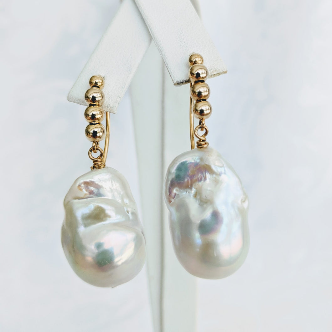 Cultured freshwater Baroque pearl earrings.
