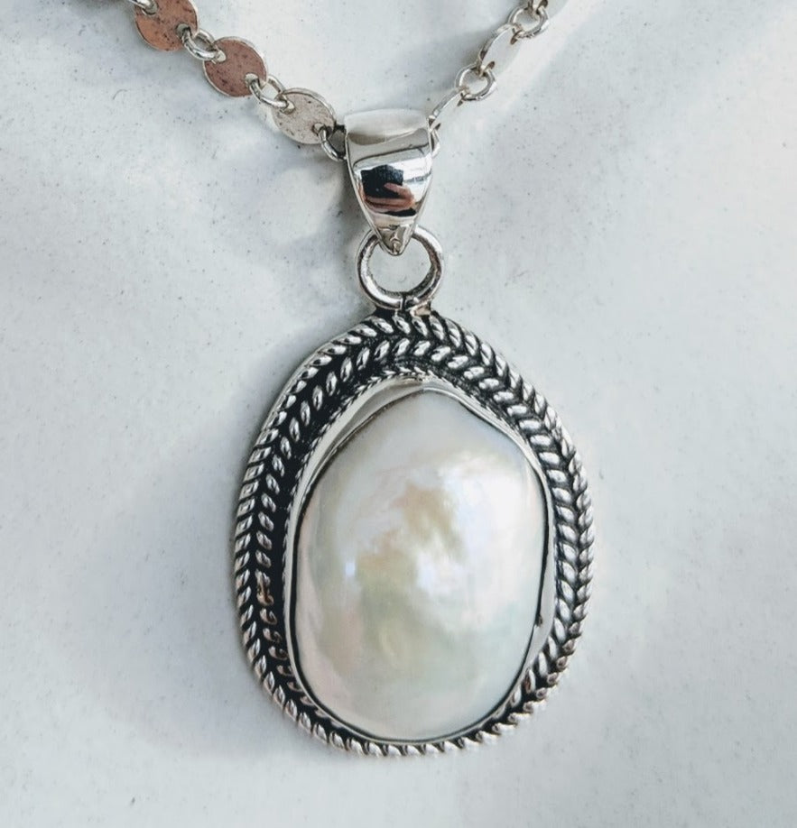 Sterling silver rope pendant with large pearl