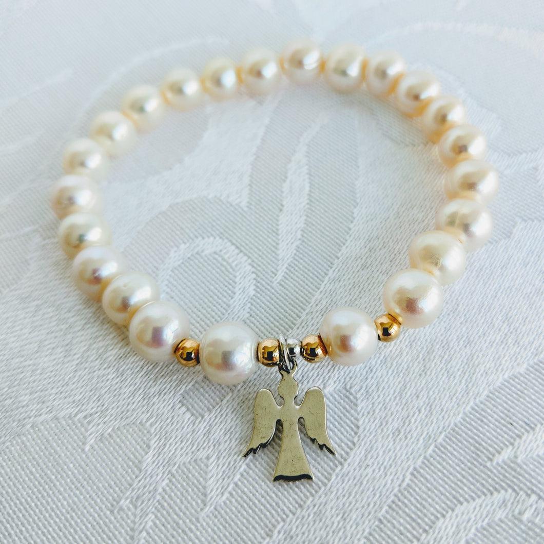 Pearl with Sterling silver Angel charm