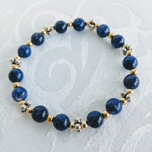 Blue sodalite bracelet with gold/silver caviar accents