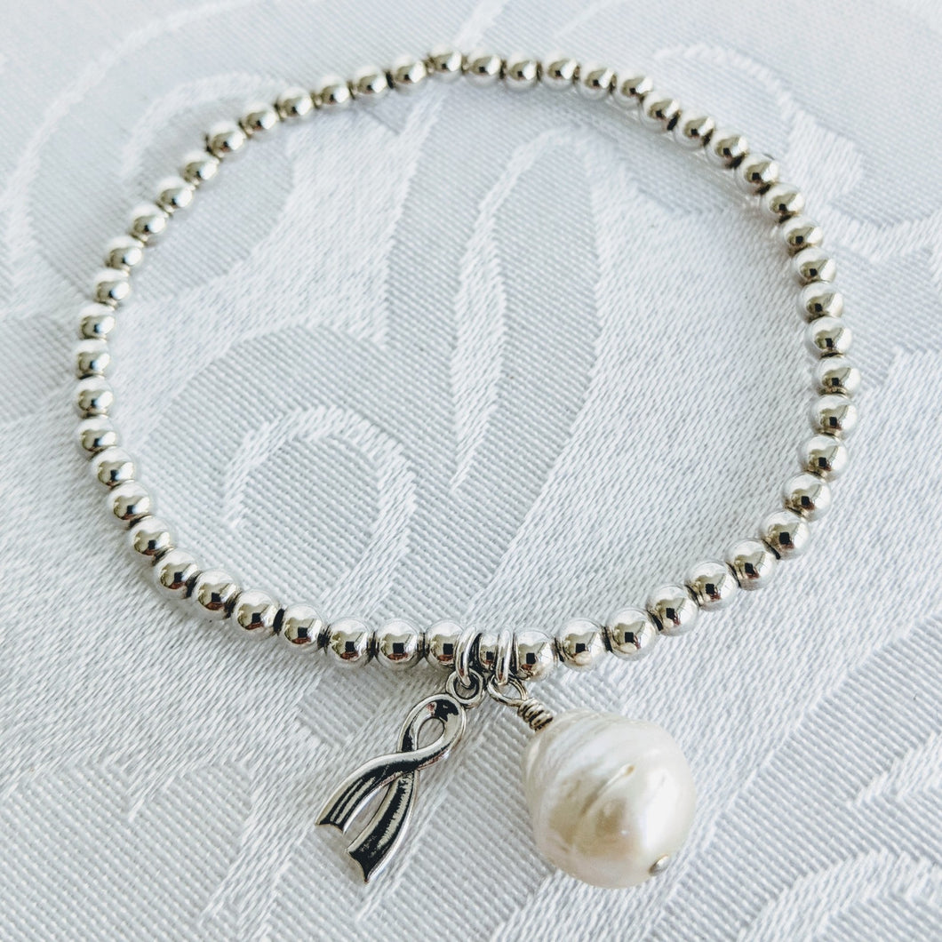 Silver balls with silver awareness ribbon and pearl charm