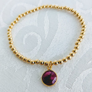 Gold beads with ruby
