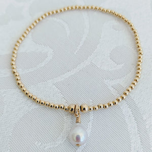 Tiny sterling gold balls with pearl charm