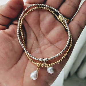 Tiny sterling gold balls with pearl charm