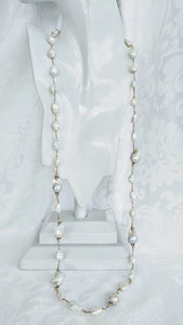 Long Freshwater Baroque and Keshi pearl with gold