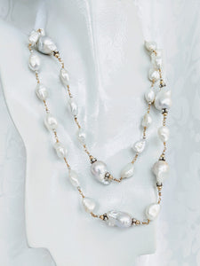 Long Freshwater Baroque and Keshi pearl with gold