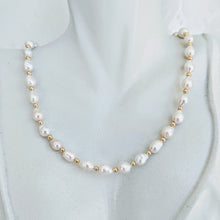 Load image into Gallery viewer, Elegant Baby Baroque pearl necklace with gold accents
