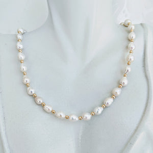 Elegant Baby Baroque pearl necklace with gold accents