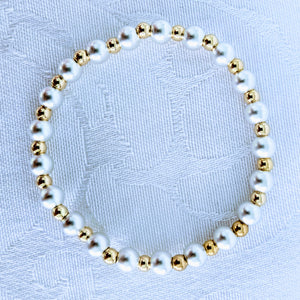 Alternating matte Sterling silver beads and bright 14k gold fill beads