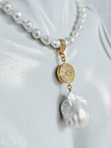 Large Baroque pearl and cubic zirconia enhancer