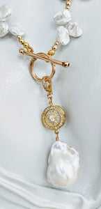 Large Baroque pearl and cubic zirconia enhancer