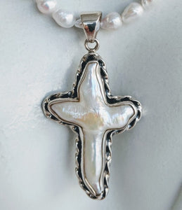 Cultured natural pearl cross set in Sterling silver