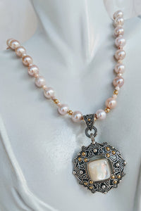 Pale pink pearl necklace with MOP pendant