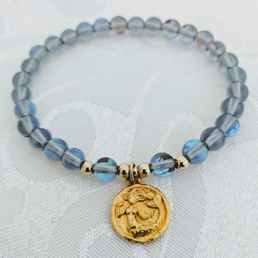 Blue glass bracelet with gold plate pewter mermaid (1/2