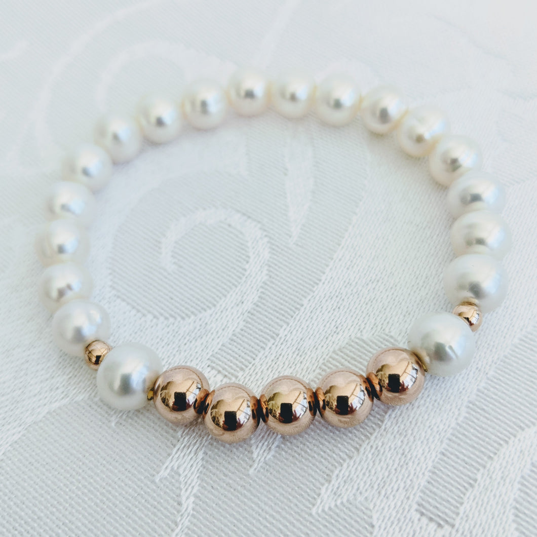 Pearl with rose gold balls