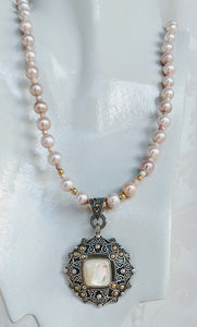 Pale pink pearl necklace with MOP pendant
