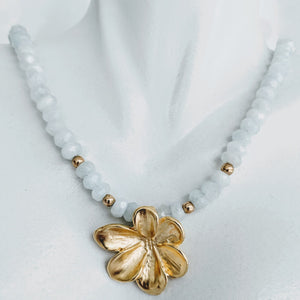 Aquamarine with gold floral pendant necklace