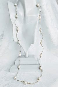 Long pearl and Sterling silver tube necklace