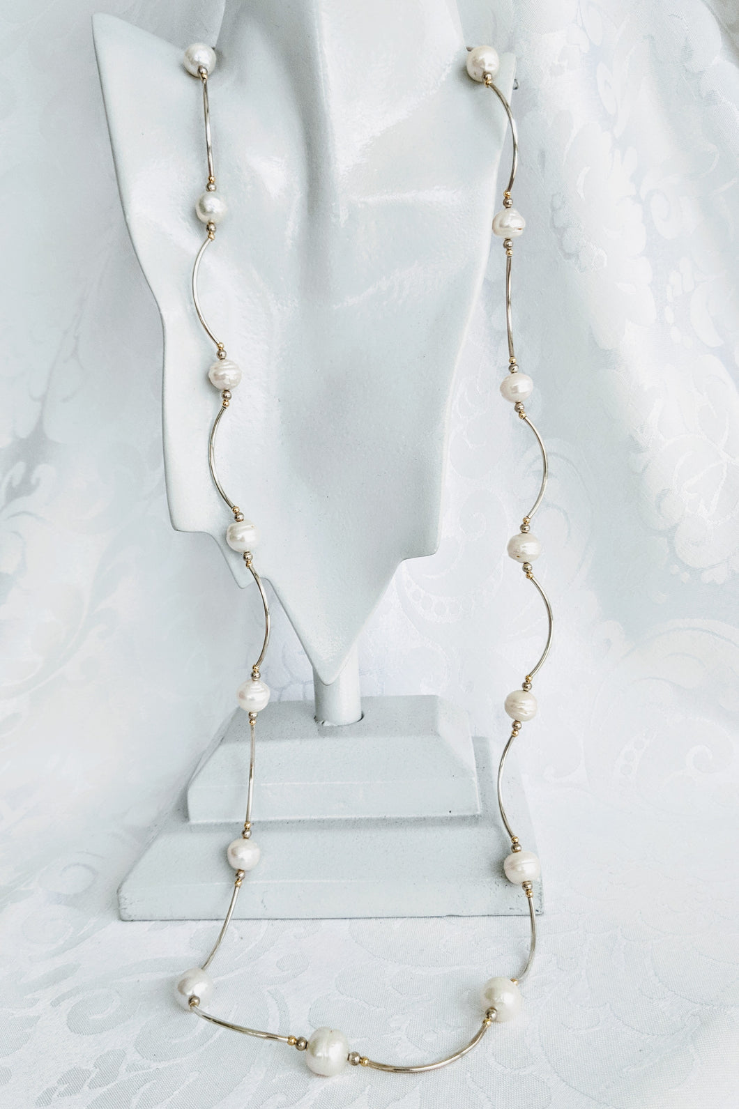 Long pearl and Sterling silver tube necklace