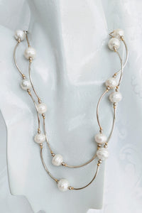 Long pearl and Sterling silver tube necklace